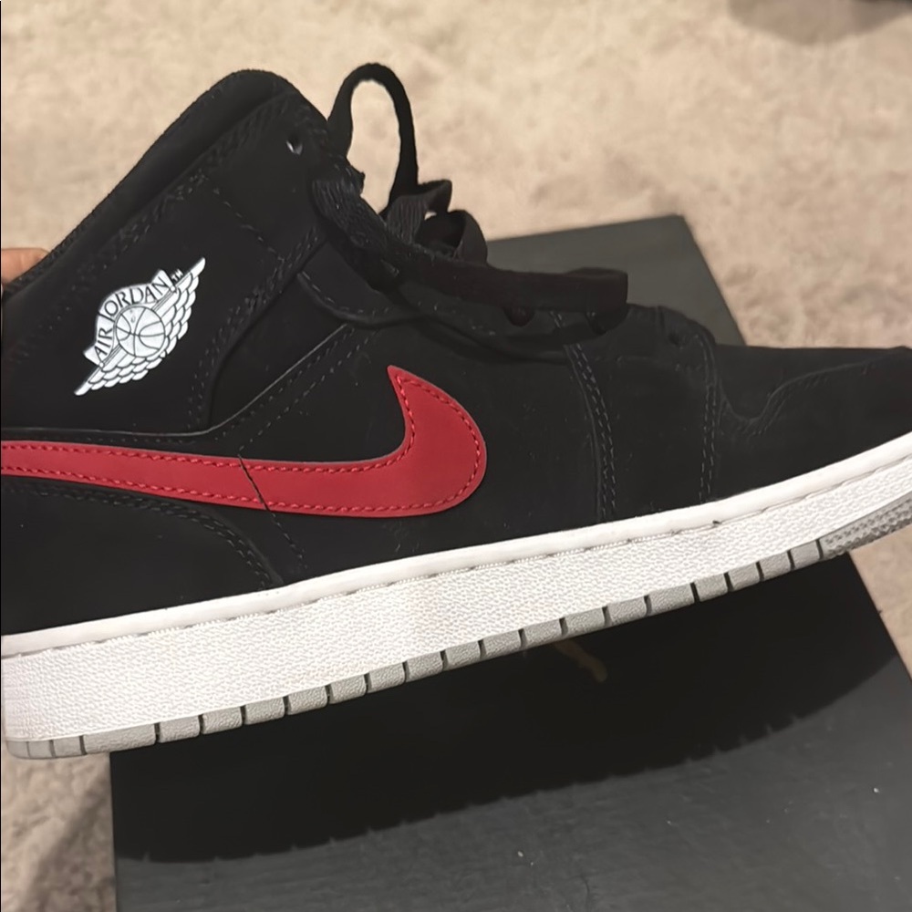 Air Jordan Black and Red Sneakers
